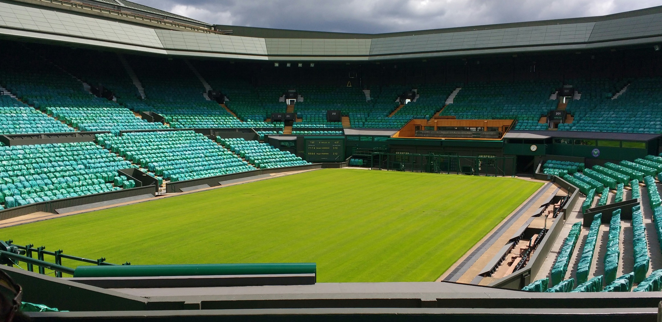Het gras van Wimbledon in Londen, waar de prijzen voor VIP-plaatsen aardig de pan uit rijzen